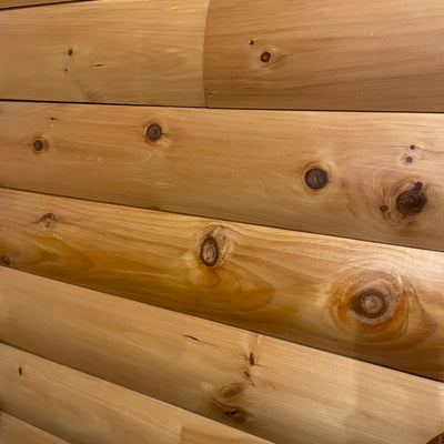 Rustic Half Log and Quarter Log Cabin Siding - Pine or Cedar
