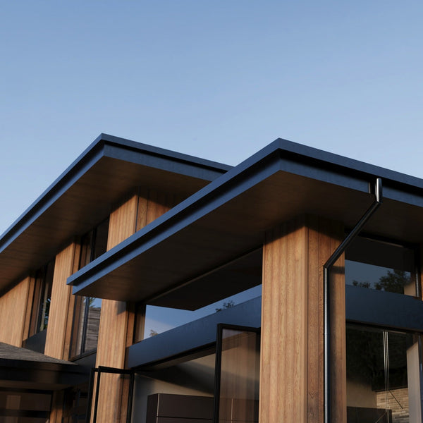Millboard Envello Siding placed along the siding with a black roof which brings out the brown in the siding.