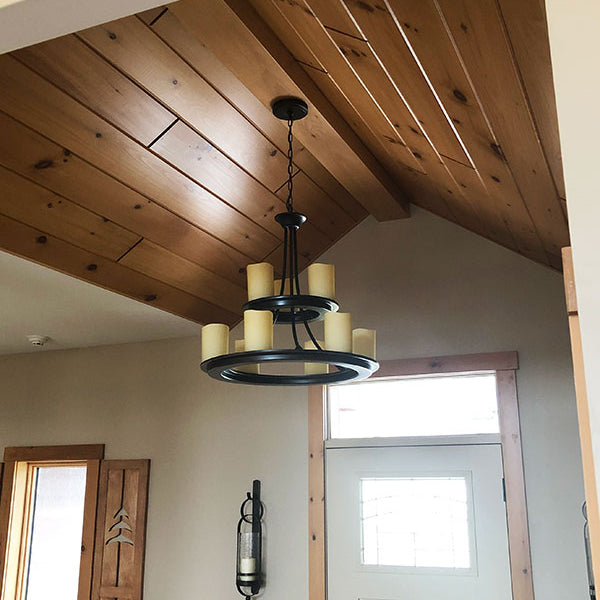 Almond v groove paneling on a ceiling overtop of an entryway. 