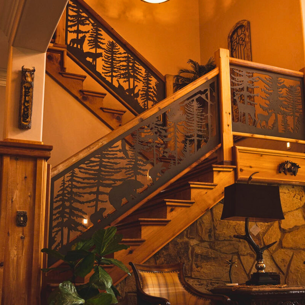 Wood staircase with bear decorative railing panels. 