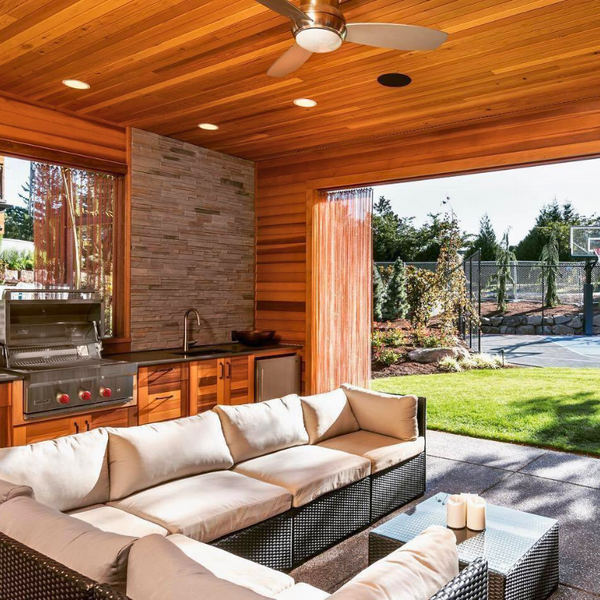 Outdoor covered kitchen with cedar wood walls
