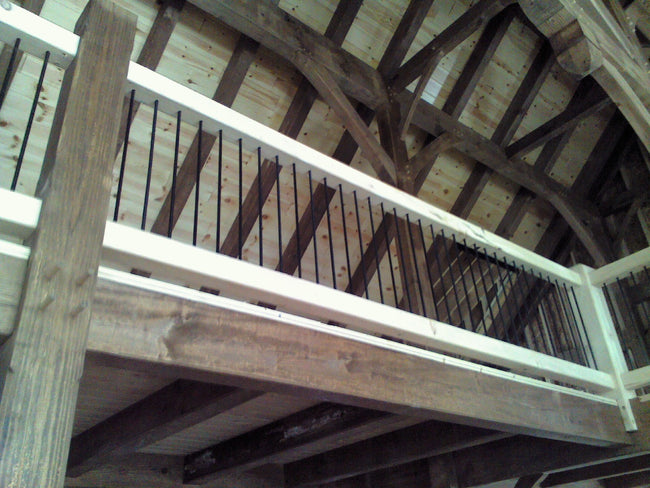 Timber Panel Rails White Pine Timber Frame Railing with Rebar Spindles - Homestead Timbers