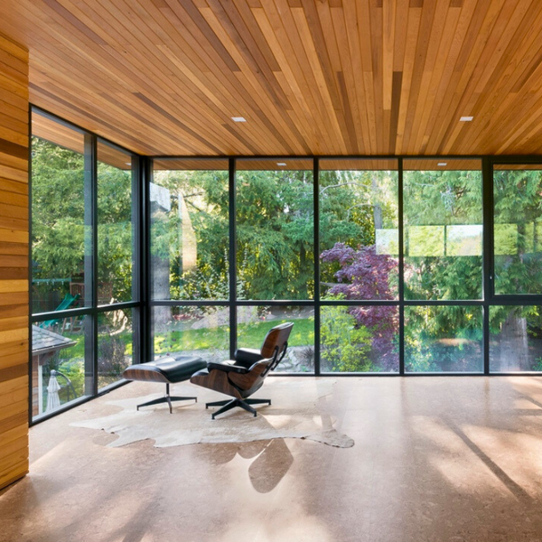 interior room with floor to ceiling windows and clear cedar on the ceiling