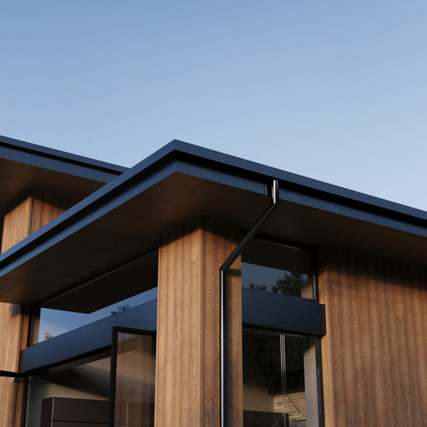 Millboard Envello Siding placed along the siding with a black roof which brings out the brown in the siding. 