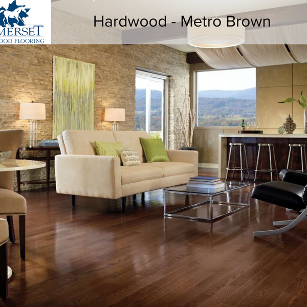 Hangout space completed with metro brown Somerset hardwood flooring. Couch and chairs surround a coffee table. 