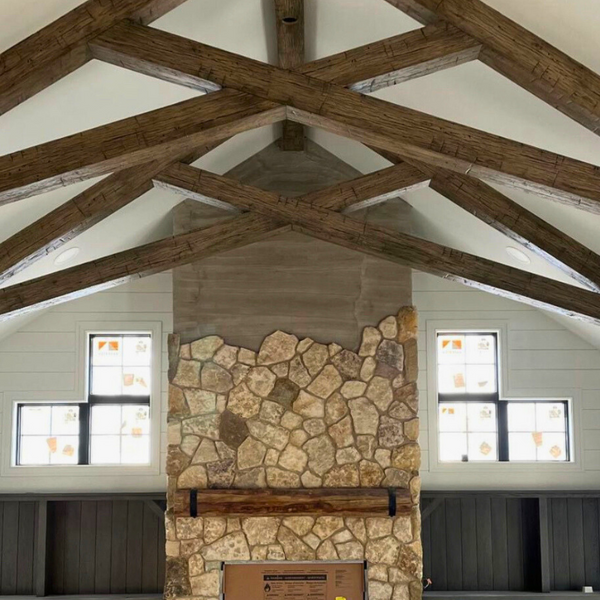 Ceiling beams made out of old wood surfcing