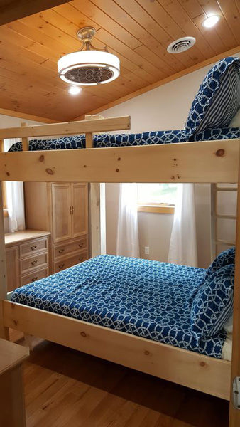 White Pine with pre-finished almond gives the room a glow from the ceiling paneling.