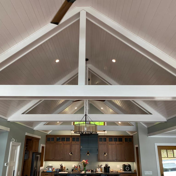 Ceiling in a house completed with White_Pine_Tongue_Groove_Pre-finished_-_Arctic_White.