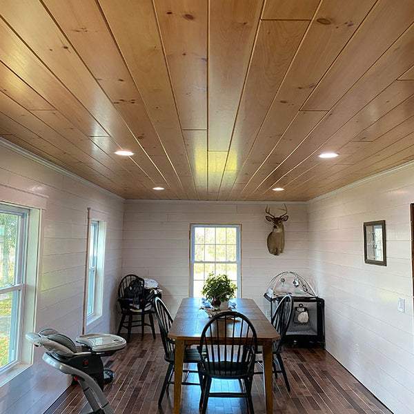 The combination of almond and whitewash finish tie the dining room together effortlessly.