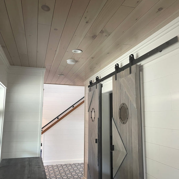 Here farmhouse glaze is paired with an arctic white to offer peace and relaxation.