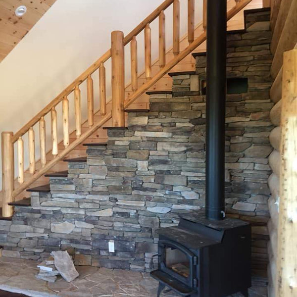 Rustic cedar log railing stairway sections