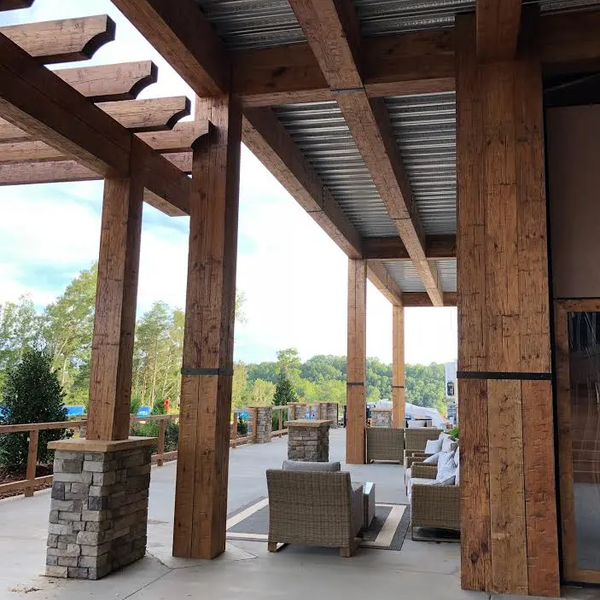 A outdoor patio finished with old wood surfacing.