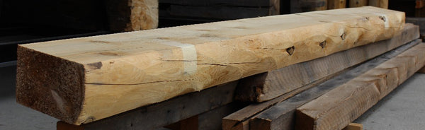 D log Mantel stacked up in warehouse