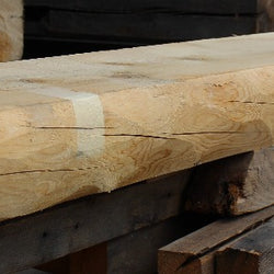 D log Mantel stacked up in warehouse