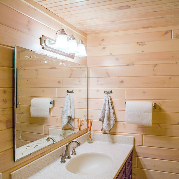 Ceiling and paneling is all stonewash for this powder room. Available at Homestead Timbers
